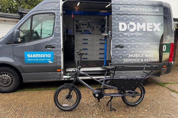 Cargo bike infron of Domex Bikes van - domexbikes.co.uk Cargo bike infron of Domex Bikes van